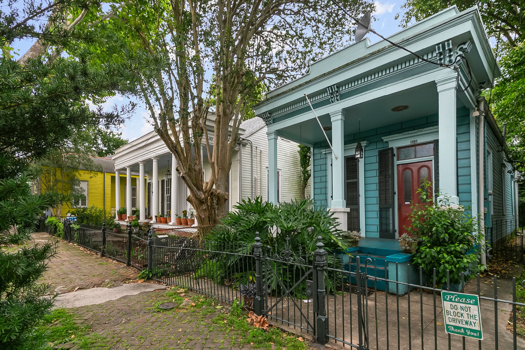 Colorful historic homes on a New Orleans neighborhood street